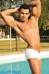 Handsome gay stallion Poax strips poolside & shows his muscular body & big rod