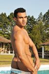 Handsome gay stallion Poax strips poolside & shows his muscular body & big rod