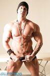 Bodybuilder Rob Diesel strips during his workout & shows his huge body & dick