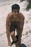 Young good-looking gay Leo 2 strips fully naked & jerks off at the beach