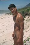 Young good-looking gay Leo 2 strips fully naked & jerks off at the beach