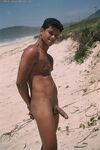 Young good-looking gay Leo 2 strips fully naked & jerks off at the beach