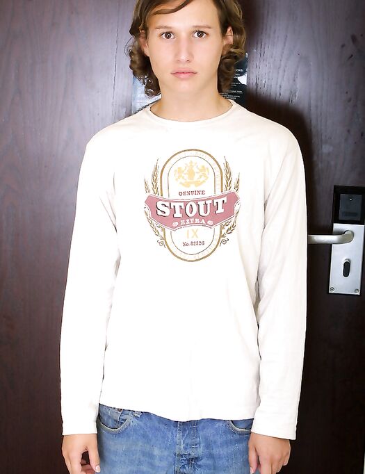 Caucasian twink Sammy Case strips naked and flaunts his huge cut dick