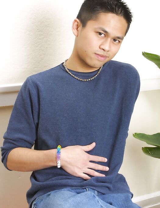 Good-looking Asian boy Jesse jerks his hairy dick until he ejaculates