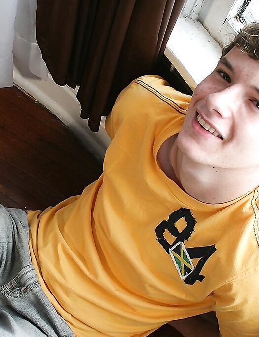 Good-looking brunette twink Devin Moss shows off his suckable big dick