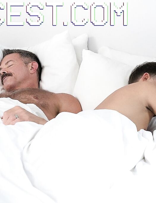 Horny twink kisses his hairy stepdad and rides his fat boner on a bed