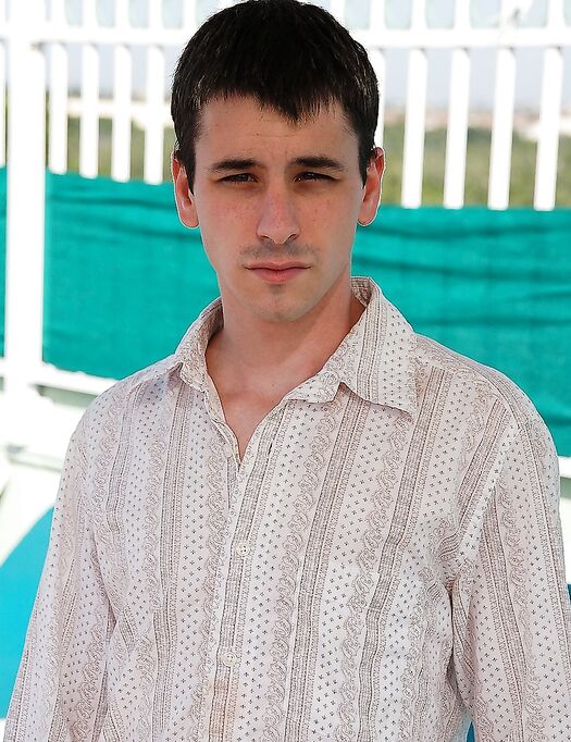 Good-looking gay Seth King strips down to his panties & flashes his hairy dick