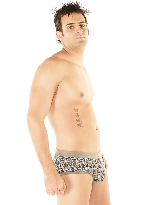 Gay hottie Andy strips his undies and shows his lean body and big dick