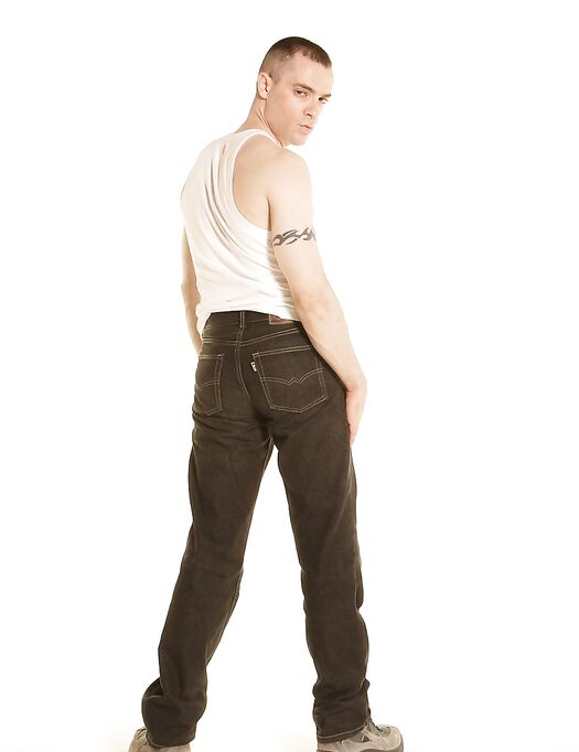 Kinky gay Latino Javier Alcazar strips and rubs his super hard dick in a solo